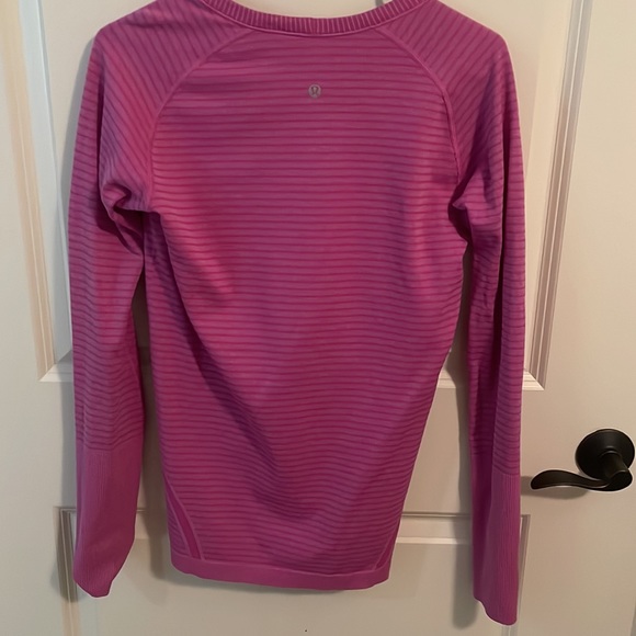 lululemon purple shirt,size 10,just has a little pilling on the arms - Picture 2 of 4